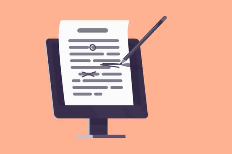 A close-up of a hand holding a pen, making corrections on a document.