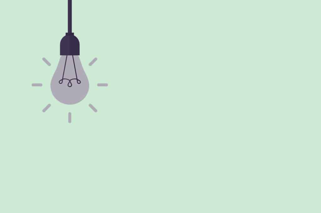 A lightbulb on a green background