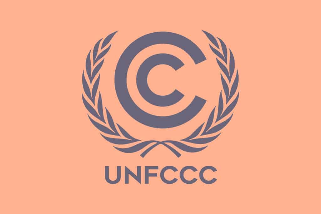 A logo for the United Nations Framework Convention on Climate Change (UNFCCC), in peach