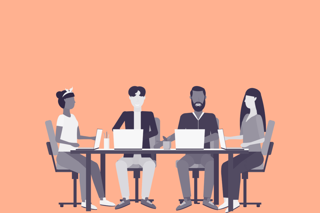 A group of 4 people sitting in a meeting with an orange background