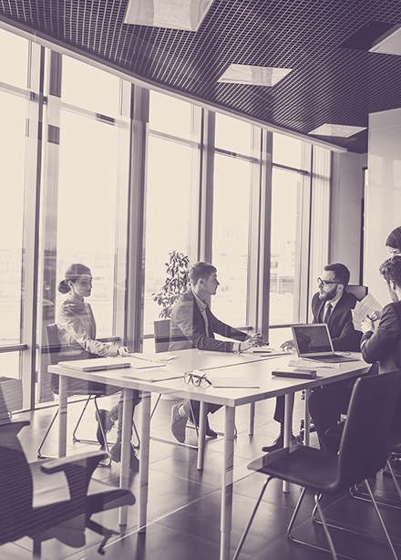 Coworkers in a conference room having a meeting