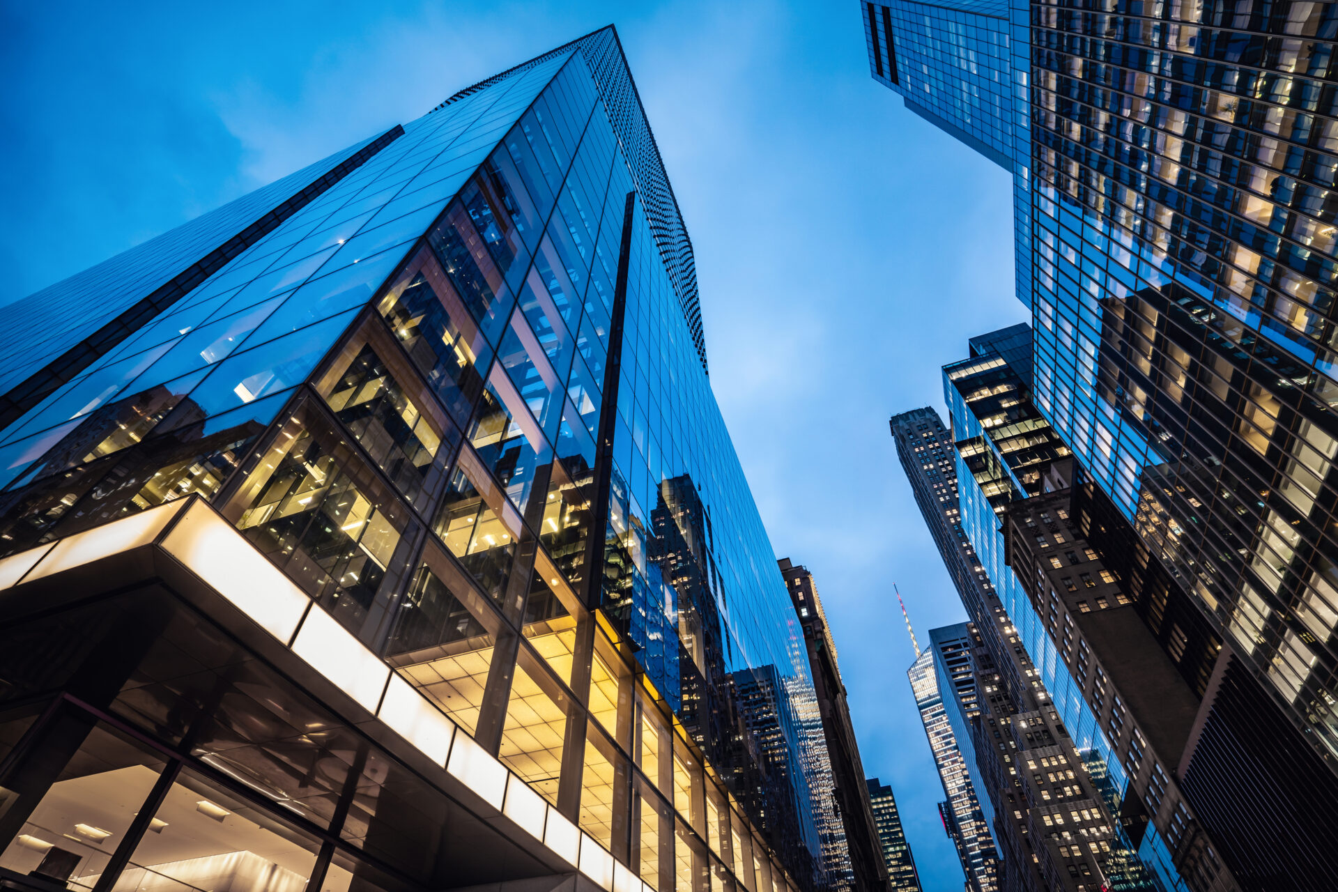 Night view of modern skyscrapers in Midtown Manhattan.